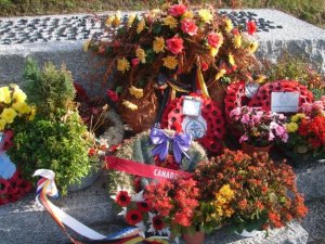 Wreaths from allied nations in the German cemetery.